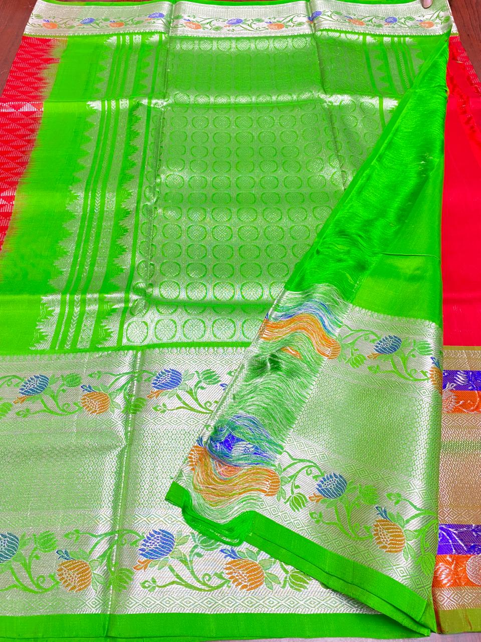 Beautiful red and green combination of pure Venkatagiri handloom Pattu saree with a 12-inch border.