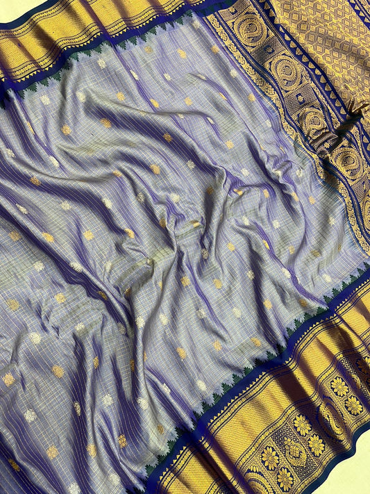 Beautiful Gray and Gold combination of pure Gadwal handloom with allover small buta Pattu saree